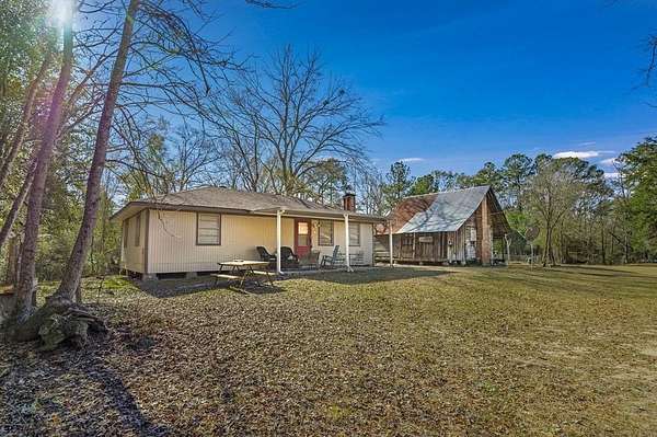 86.8 Acres of Recreational Land with Home for Sale in Huntington, Texas