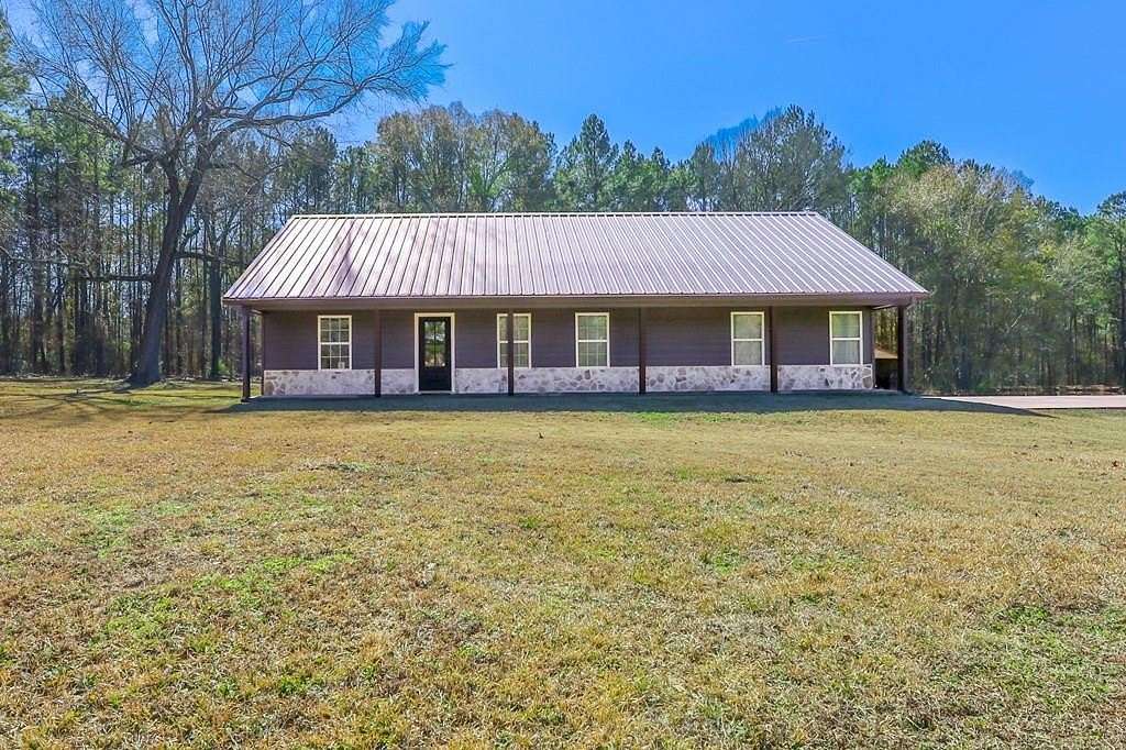 5.43 Acres of Land with Home for Sale in Huntington, Texas