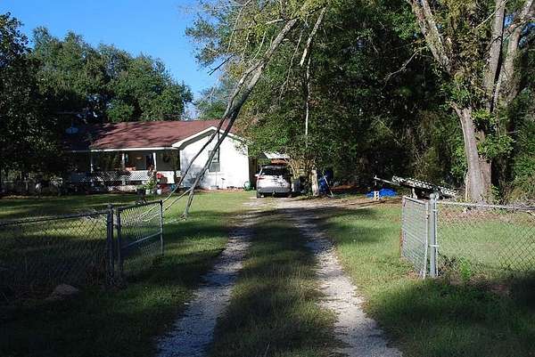 9.4 Acres of Land with Home for Sale in Groveton, Texas