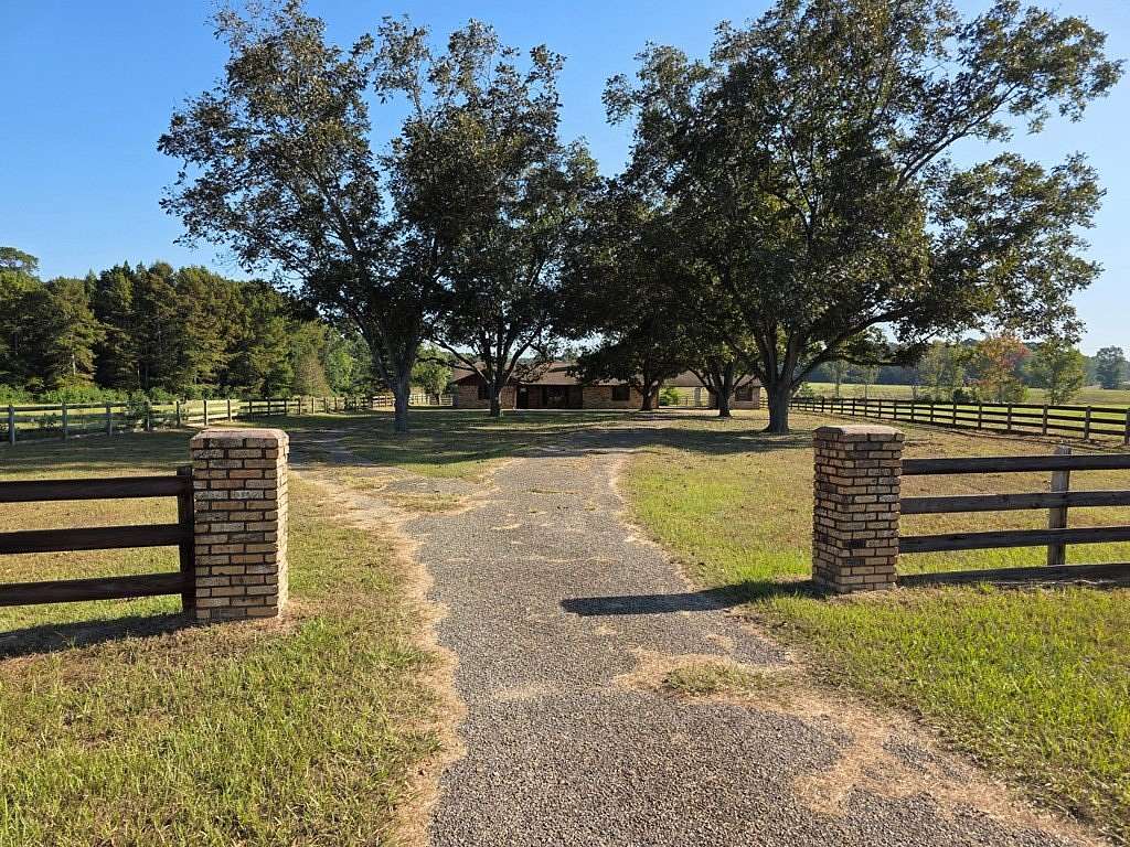 80.1 Acres of Agricultural Land with Home for Sale in Jasper, Texas