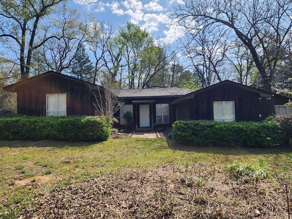 25.6 Acres of Agricultural Land with Home for Sale in Colmesneil, Texas
