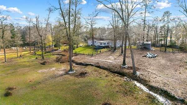 9.19 Acres of Land with Home for Sale in Nacogdoches, Texas