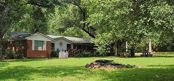 25.8 Acres of Recreational Land with Home for Sale in Alto, Texas