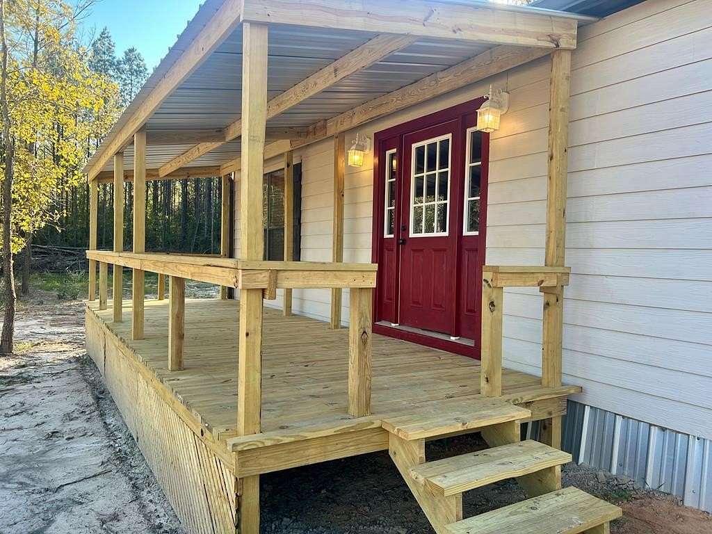 10.5 Acres of Land with Home for Sale in Colmesneil, Texas