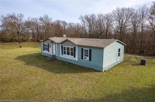 5 Acres of Land with Home for Sale in Gans, Oklahoma