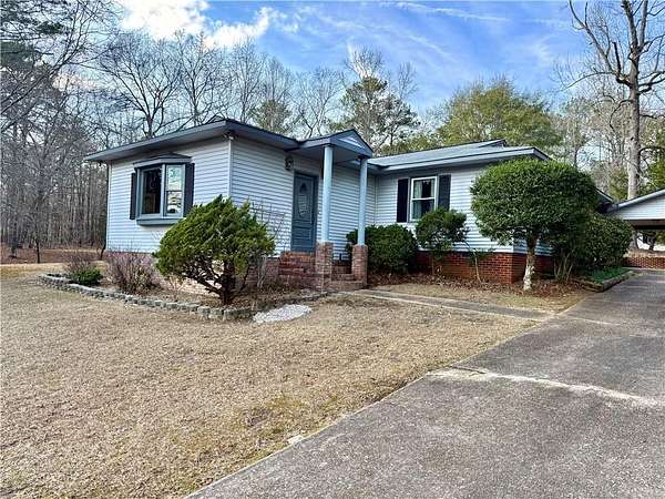 7.14 Acres of Land with Home for Sale in Opelika, Alabama