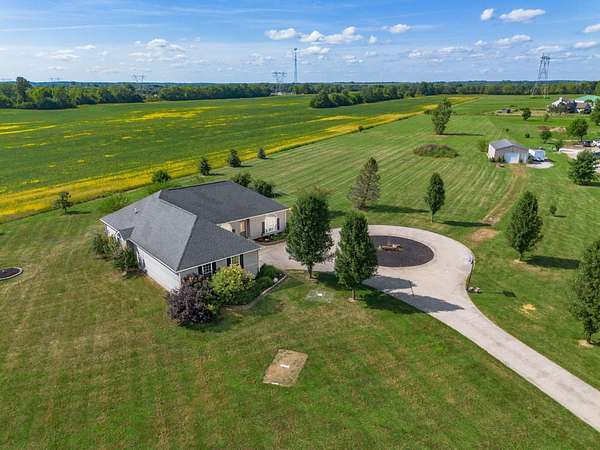 5 Acres of Land with Home for Sale in Ostrander, Ohio