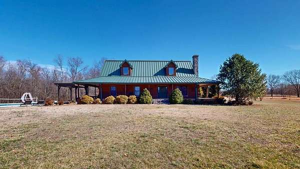 14 Acres of Land with Home for Sale in Puryear, Tennessee