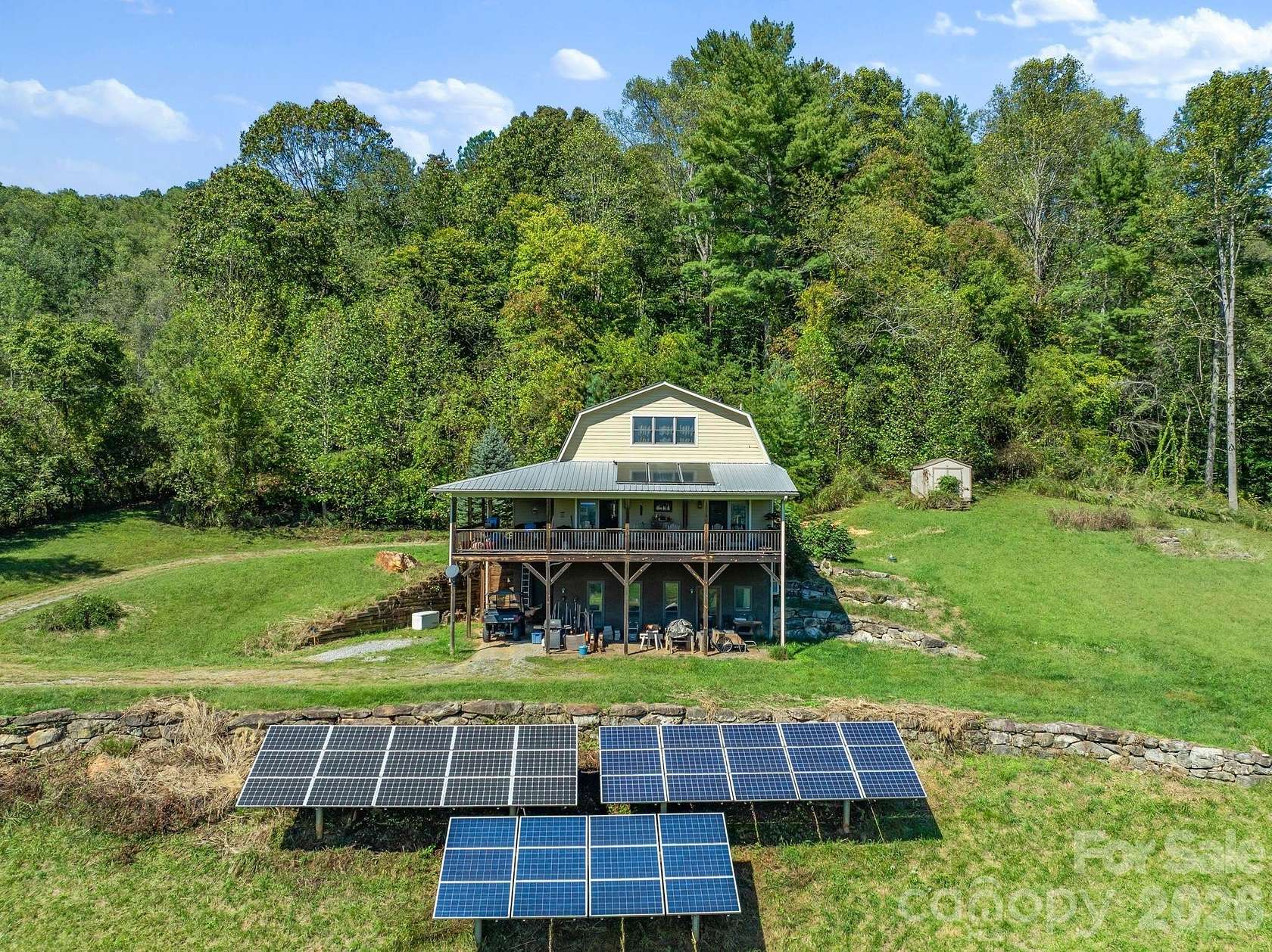 36.3 Acres of Land with Home for Sale in Marshall, North Carolina