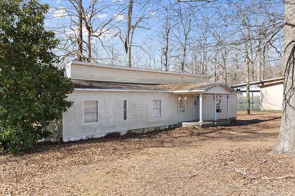 4.1 Acres of Land with Home for Auction in Pleasant View, Tennessee
