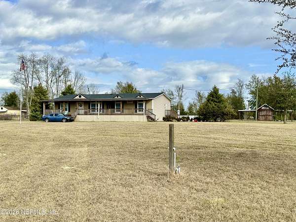 4.78 Acres of Land with Home for Sale in Fort White, Florida