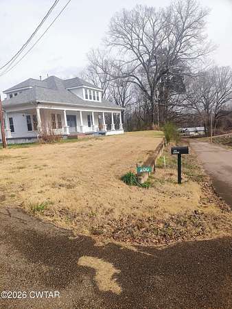 6.86 Acres of Land with Home for Sale in Saulsbury, Tennessee