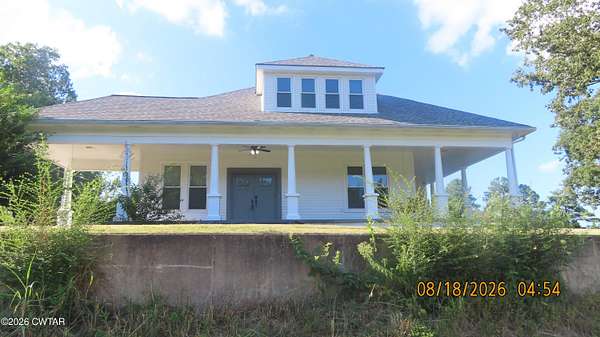 6.86 Acres of Land with Home for Sale in Saulsbury, Tennessee