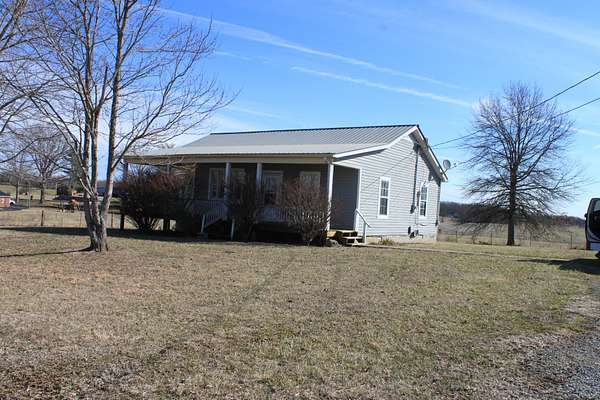 4.78 Acres of Land with Home for Auction in Smithville, Tennessee