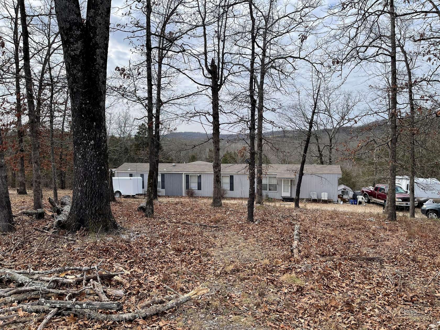 9.59 Acres of Land with Home for Sale in Taneyville, Missouri