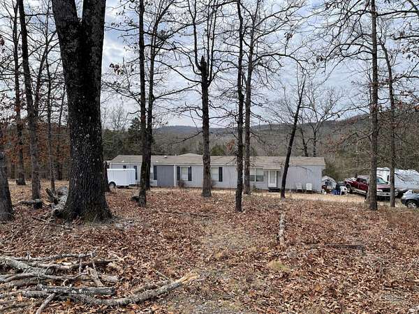 9.59 Acres of Land with Home for Sale in Taneyville, Missouri