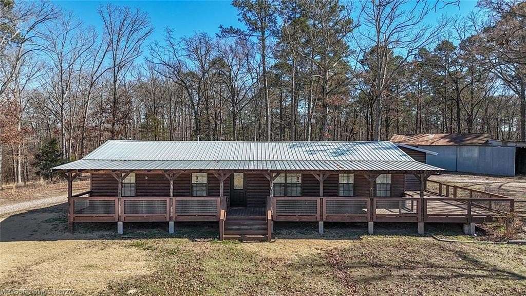4.36 Acres of Land with Home for Sale in Mena, Arkansas