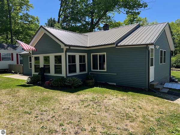 2.1 Acres of Land with Home for Sale in Harrison, Michigan