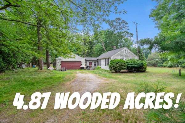 4.88 Acres of Land with Home for Sale in Norton Shores, Michigan