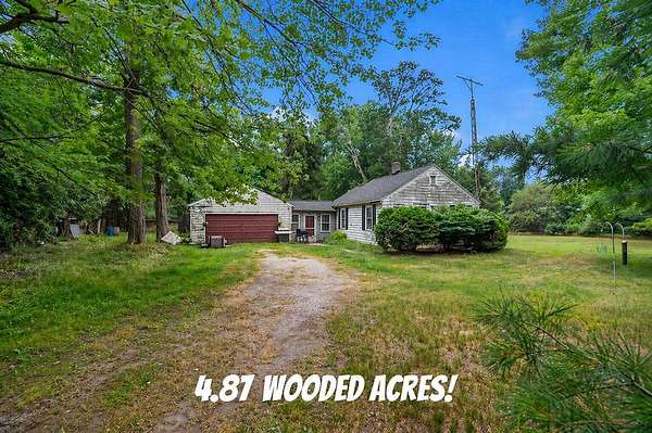 4.88 Acres of Land with Home for Sale in Norton Shores, Michigan