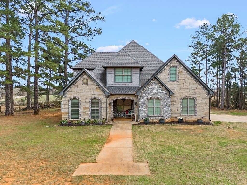 5 Acres of Land with Home for Sale in Gilmer, Texas