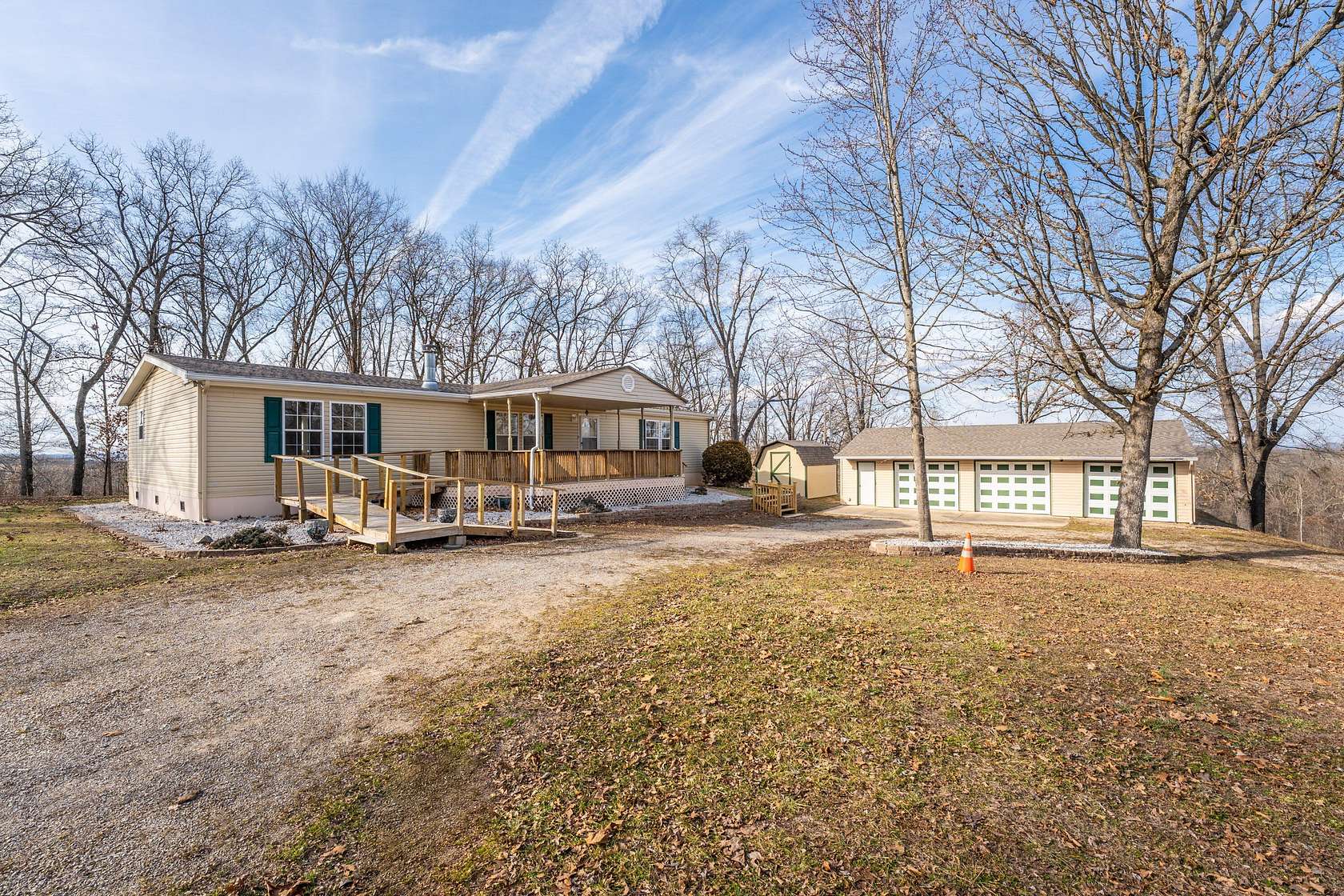 10.8 Acres of Land with Home for Sale in Golden, Missouri