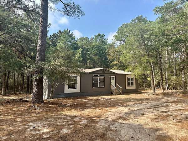 5 Acres of Land with Home for Sale in New Ulm, Texas