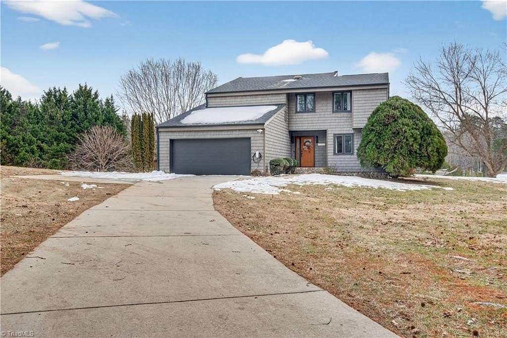 2 Acres of Land with Home for Sale in Oak Ridge, North Carolina