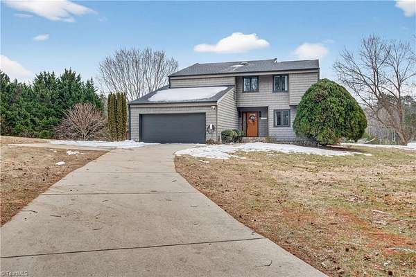 2 Acres of Land with Home for Sale in Oak Ridge, North Carolina