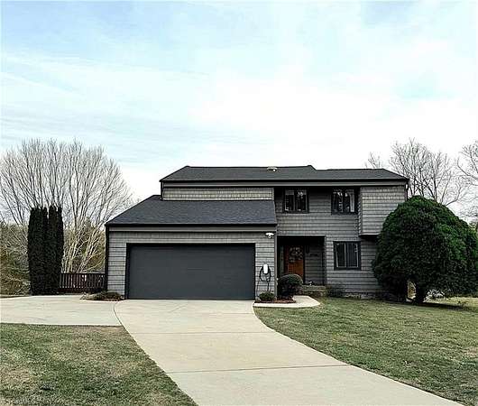 2 Acres of Land with Home for Sale in Oak Ridge, North Carolina