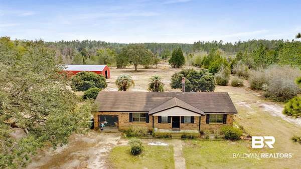 9.86 Acres of Land with Home for Sale in Seminole, Alabama