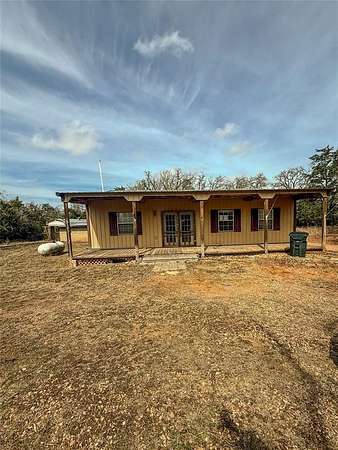 1.88 Acres of Land with Home for Sale in Giddings, Texas