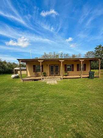 1.88 Acres of Land with Home for Sale in Giddings, Texas