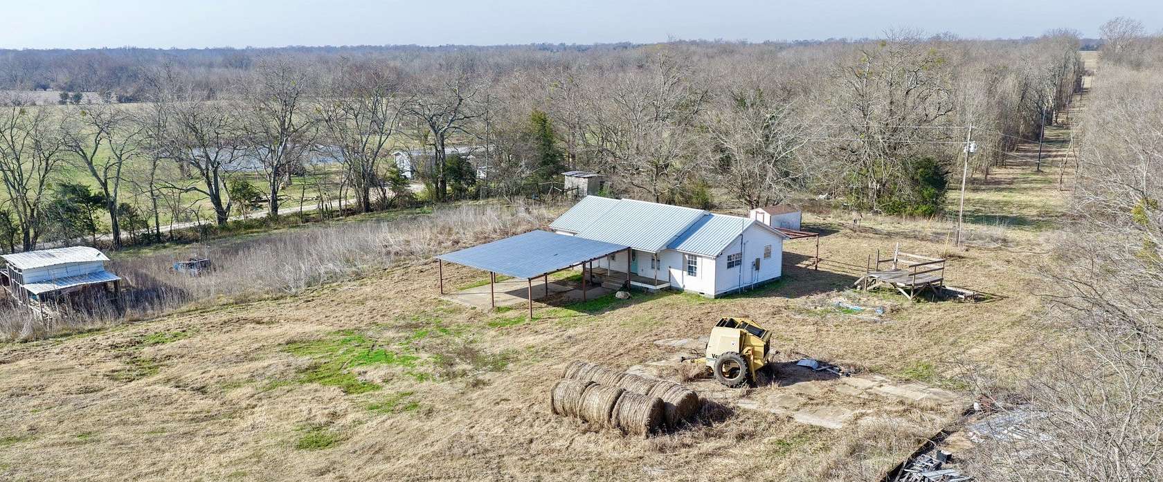2 Acres of Land with Home for Sale in Deport, Texas