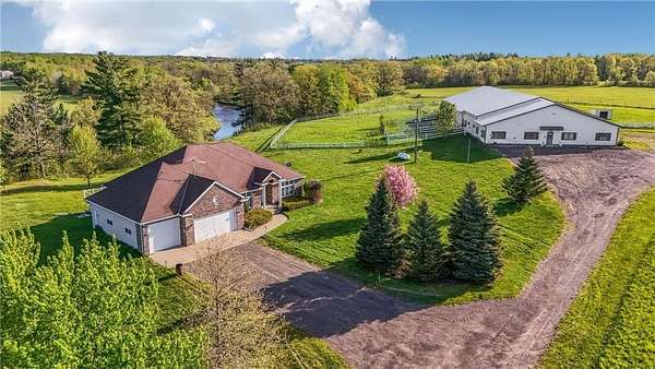 26.4 Acres of Agricultural Land with Home for Sale in Milaca, Minnesota