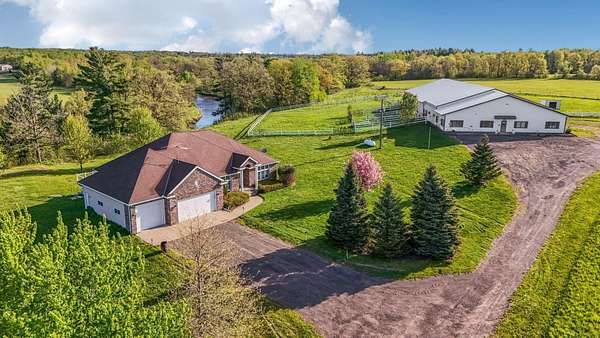 26.4 Acres of Agricultural Land with Home for Sale in Milaca, Minnesota