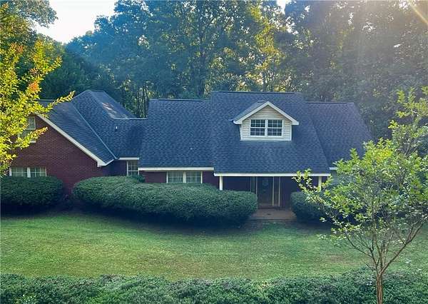 7.63 Acres of Land with Home for Sale in Valley, Alabama