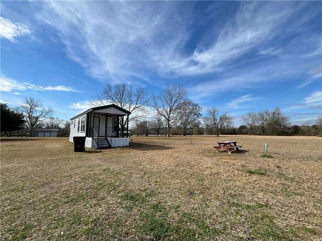 6.17 Acres of Land with Home for Sale in Grand Bay, Alabama