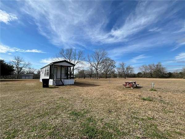 6.17 Acres of Land with Home for Sale in Grand Bay, Alabama