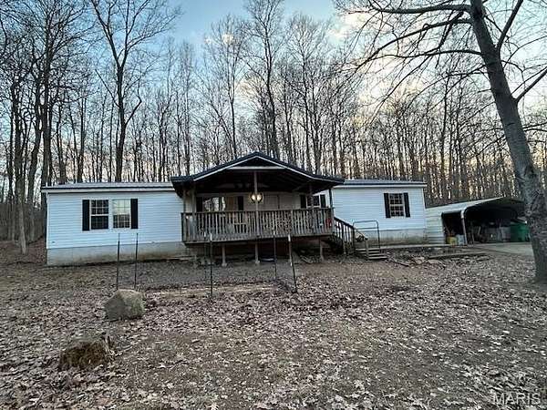 12.3 Acres of Land with Home for Sale in Glen Allen, Missouri