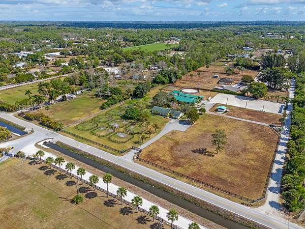 5 Acres of Land with Home for Sale in Loxahatchee Groves, Florida