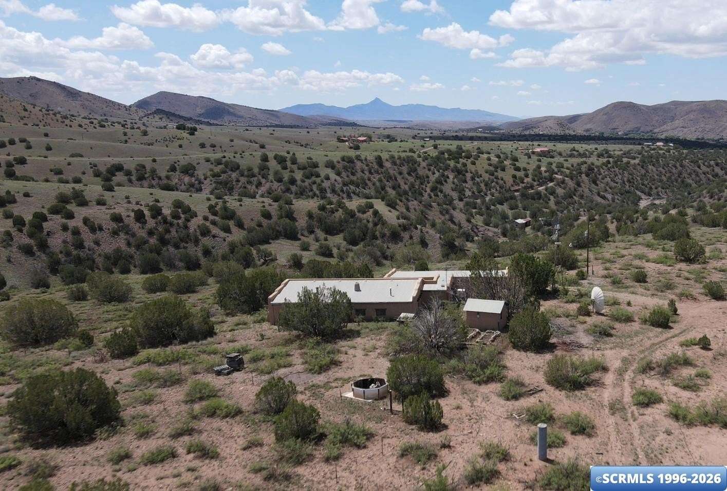 180 Acres of Agricultural Land with Home for Sale in San Lorenzo, New Mexico