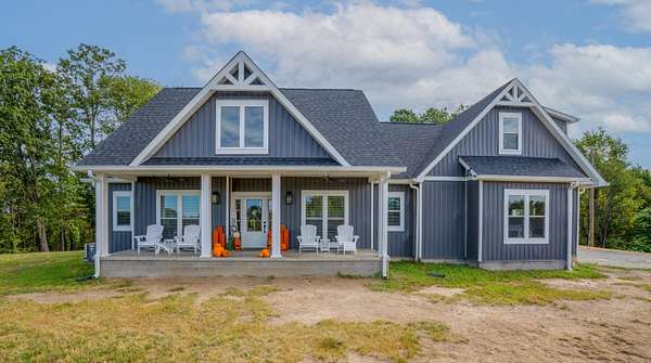 84.6 Acres of Land with Home for Sale in Strunk, Kentucky