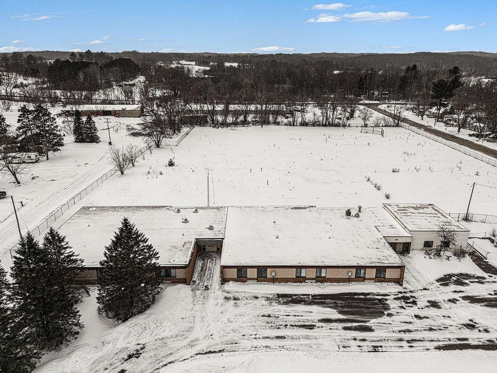 4.14 Acres of Improved Commercial Land for Sale in Shelby, Michigan