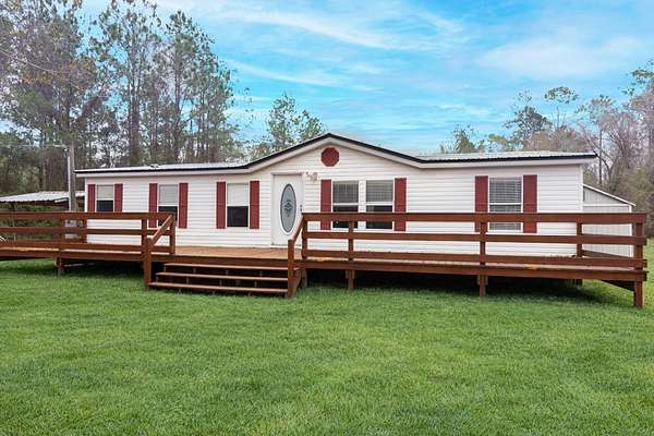 22.5 Acres of Agricultural Land with Home for Sale in Waldo, Florida