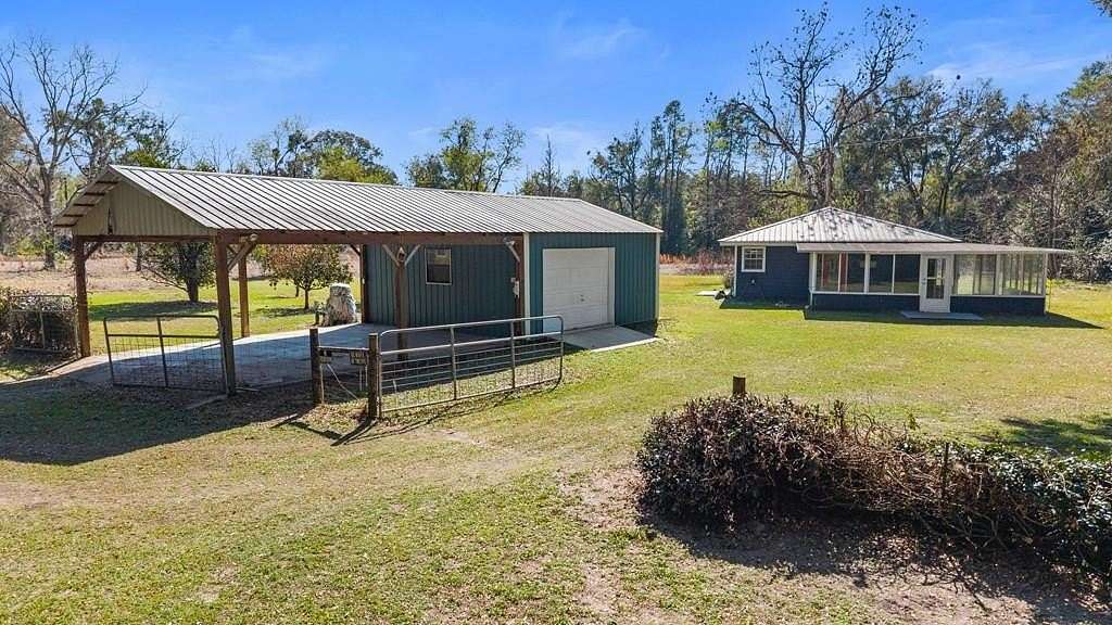 5.22 Acres of Land with Home for Sale in Trenton, Florida