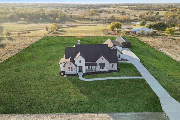 2 Acres of Land with Home for Sale in Justin, Texas