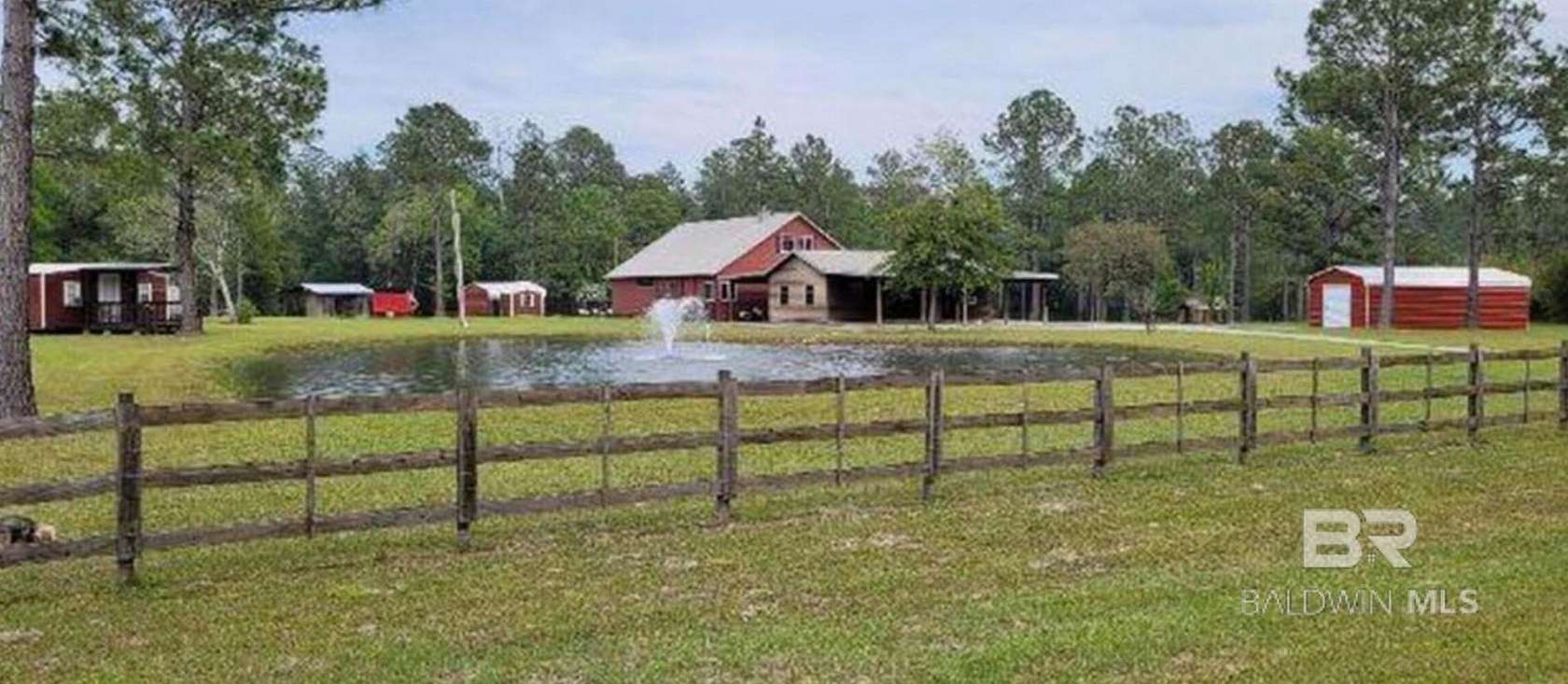 5 Acres of Land with Home for Sale in Robertsdale, Alabama