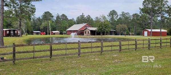 5 Acres of Land with Home for Sale in Robertsdale, Alabama