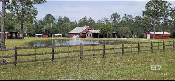 5 Acres of Land with Home for Sale in Robertsdale, Alabama